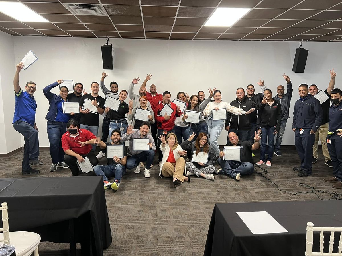 Participants celebrating with their certificates